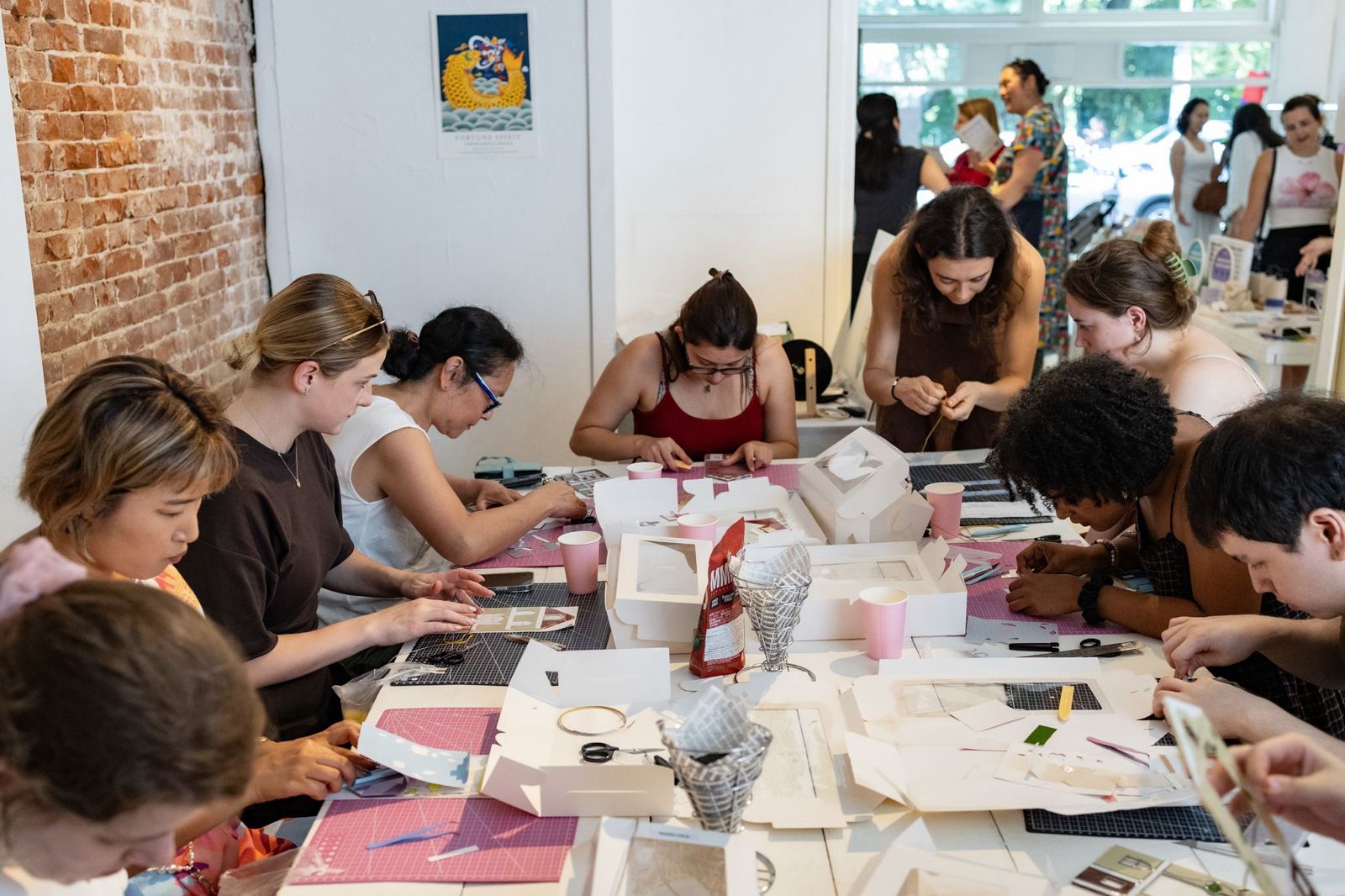 Team building group creating Korean Glass Art during a creative workshop in Dresden